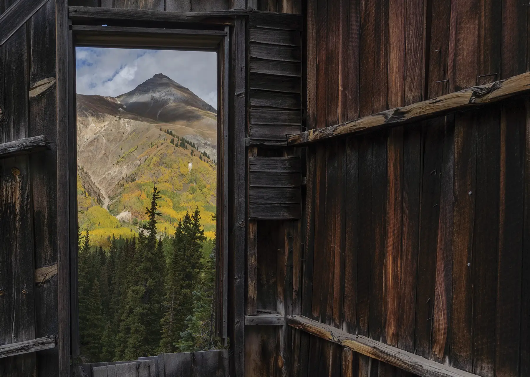 view of the San Juan Skyway through a cabin window slot